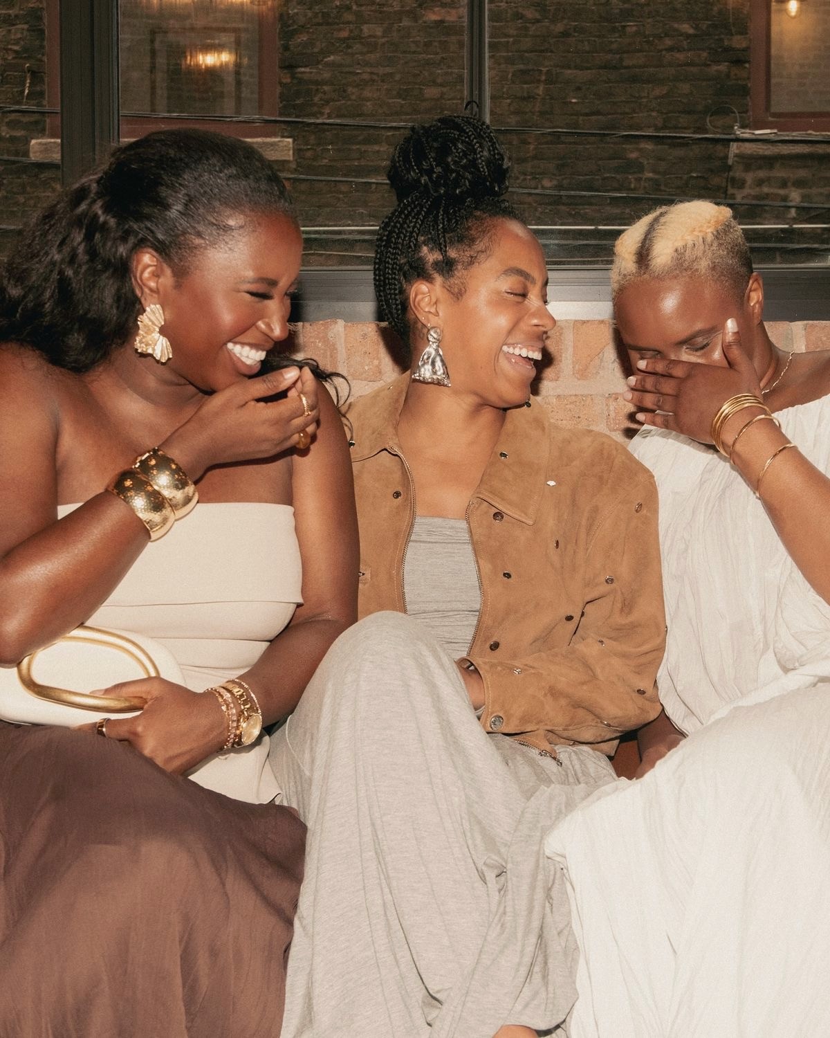 Friends laughing together at a Reflection Night
